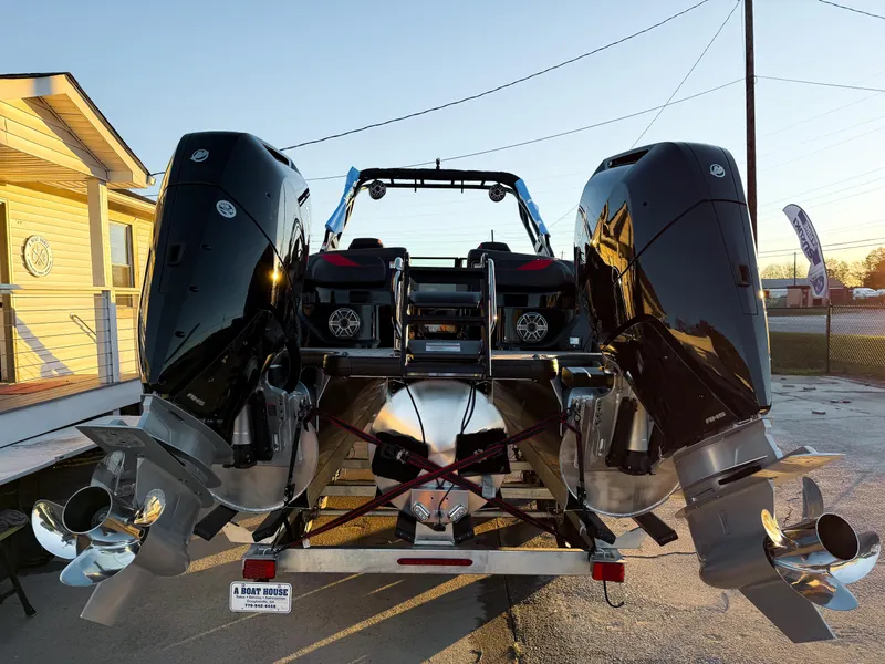 Slide: The Image of 2024 Godfrey XP 27' boat with twin 400HP V10 engines, rear view. - 5