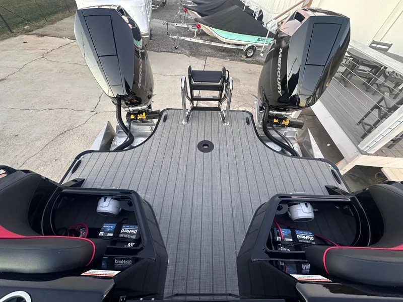 Slide: The Image of 2025 Godfrey XP 2700 W boat with twin 400HP engines, rear deck view. - 8