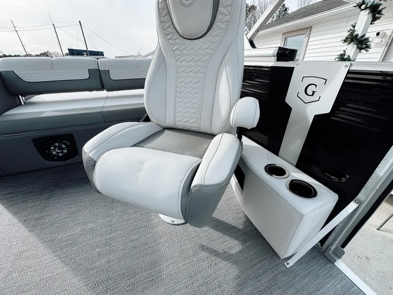 Slide: The Image of Luxurious seating on 2025 Godfrey Monaco 23' Dual Flip Lounge Tritoon boat. - 10