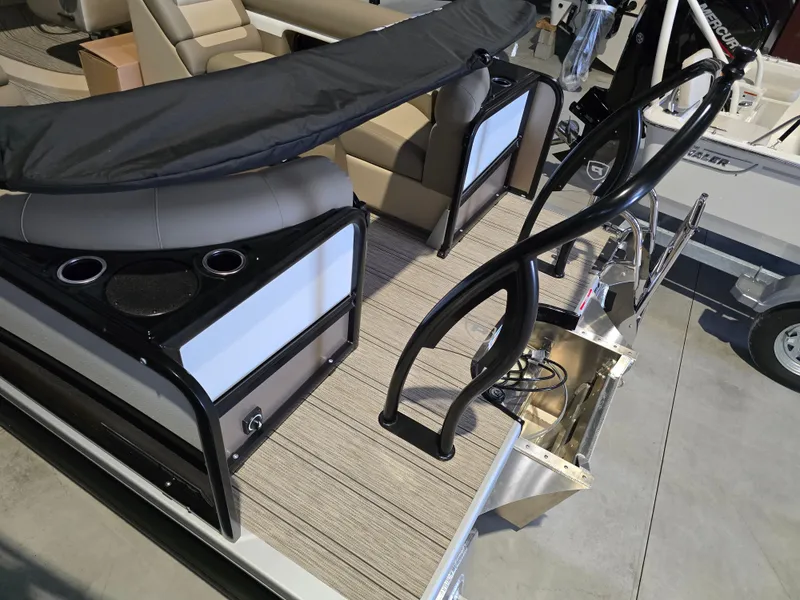 Slide: The Image of 2025 Premier 230 SunSation RF pontoon boat interior with seating and deck details. - 10
