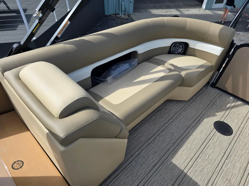 Slide: The Image of 2025 Premier 230 SunSation RF boat dashboard with steering wheel and controls. - 27