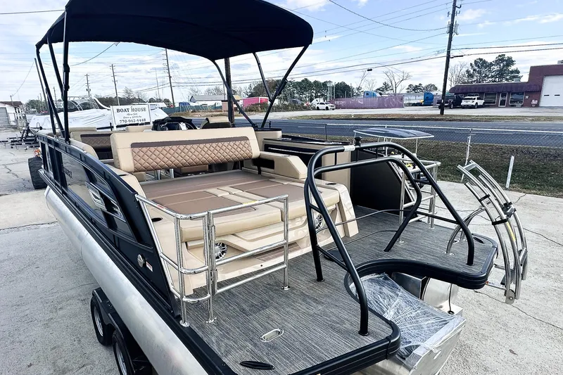 Slide: The Image of Luxurious interior of 2025 Godfrey AquaPatio 25' Flip Lounge Tritoon boat. - 16