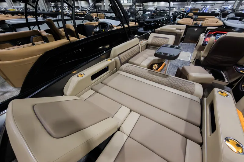 Slide: The Image of Luxurious interior of 2025 Godfrey AquaPatio 25' Flip Lounge Tritoon with plush seating and modern design. - 24