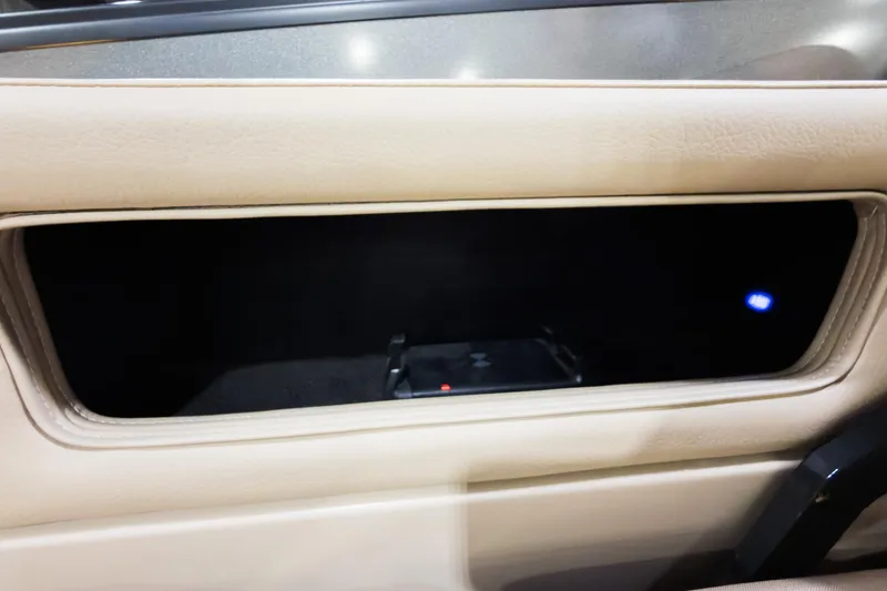 Slide: The Image of Interior storage compartment of 2025 Godfrey AquaPatio 25' Flip Lounge Tritoon. - 28