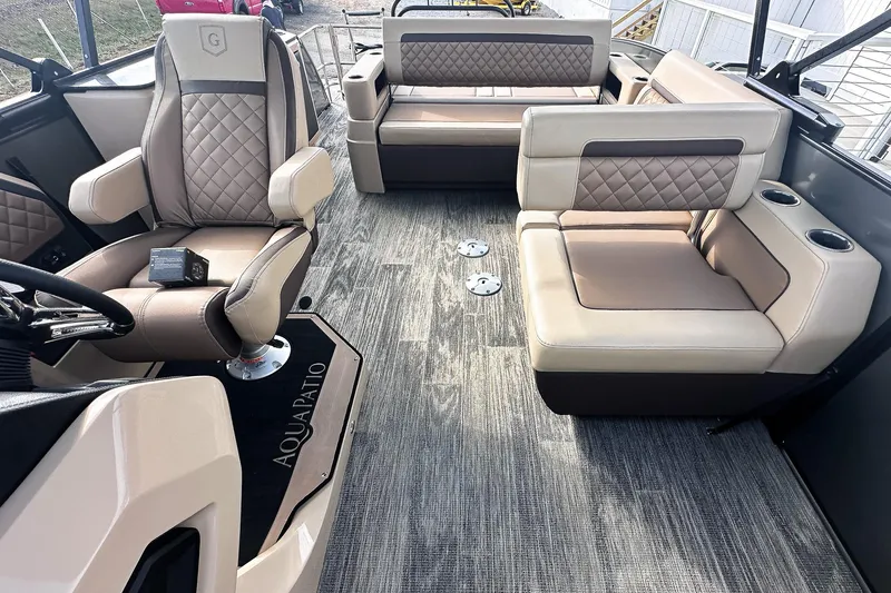 Slide: The Image of 2025 Godfrey AquaPatio 25' Flip Lounge Tritoon interior with luxurious seating and modern design. - 35