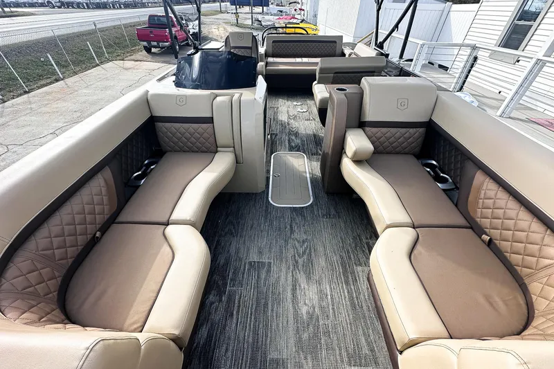 Slide: The Image of Luxurious seating on 2025 Godfrey AquaPatio 25' Flip Lounge Tritoon, showcasing elegant design and comfort. - 4