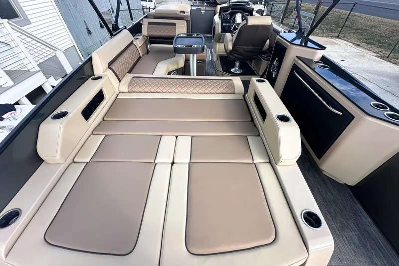 Slide: The Image of 2025 Godfrey AquaPatio 25' Flip Lounge Tritoon interior with luxurious seating and modern design. - 42