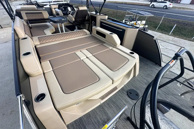 Slide: The Image of 2025 Godfrey AquaPatio 25' Tritoon with luxurious flip lounge seating and modern design. - 43