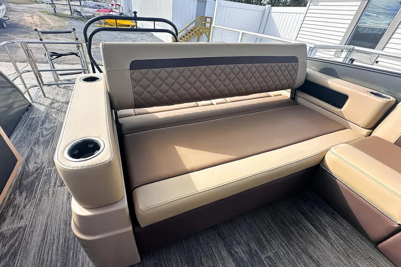 Slide: The Image of Luxurious seating on 2025 Godfrey AquaPatio 25' Flip Lounge Tritoon boat. - 47