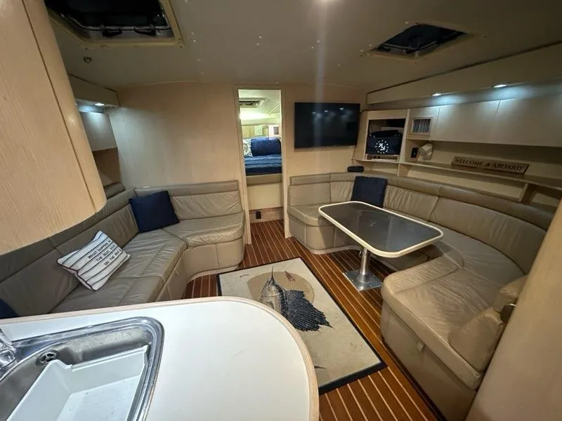Slide: The Image of Luxurious interior of 1996 Tiara Yachts 43 Open with plush seating and modern amenities. - 15