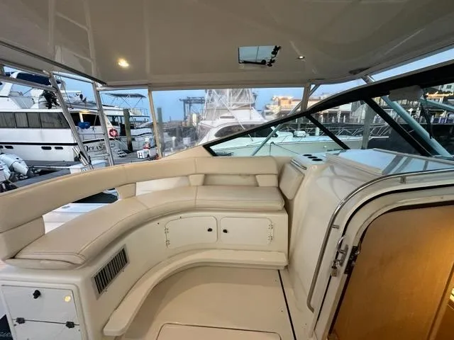 Slide: The Image of 1996 Tiara Yachts 43 Open interior with plush seating and sleek design. - 33