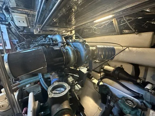 Slide: The Image of Engine room of a 1996 Tiara Yachts 43 Open, showcasing mechanical components. - 39