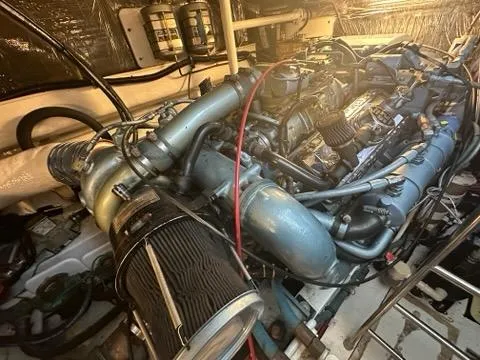 Slide: The Image of Engine room of a 1996 Tiara Yachts 43 Open, showcasing detailed machinery. - 41