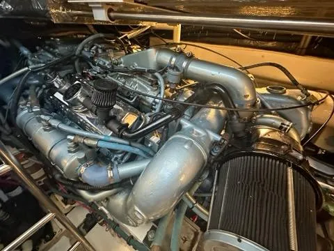 Slide: The Image of Engine room of 1996 Tiara Yachts 43 Open, showcasing detailed mechanical components. - 42