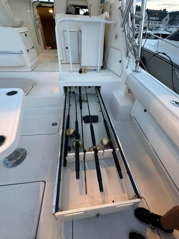 Slide: The Image of Tiara Yachts 1996 model 43 Open with fishing rod storage compartment. - 48