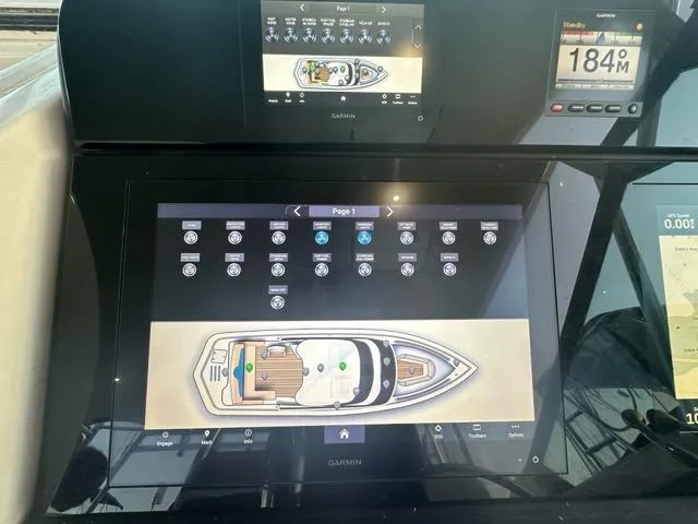 Slide: The Image of Tiara Yachts 1996 43 Open dashboard with Garmin navigation display. - 8