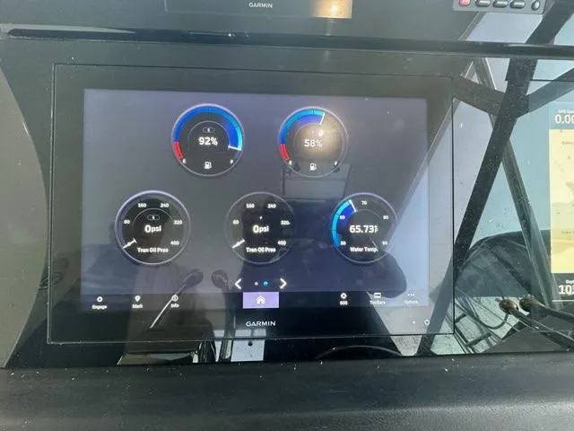 Slide: The Image of Garmin display on 1996 Tiara Yachts 43 Open showing engine and water tank data. - 9