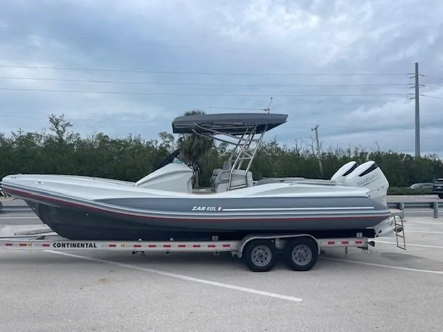 The Image of 2023 Zar Formenti 85 SL boat on trailer, parked outdoors. - 1