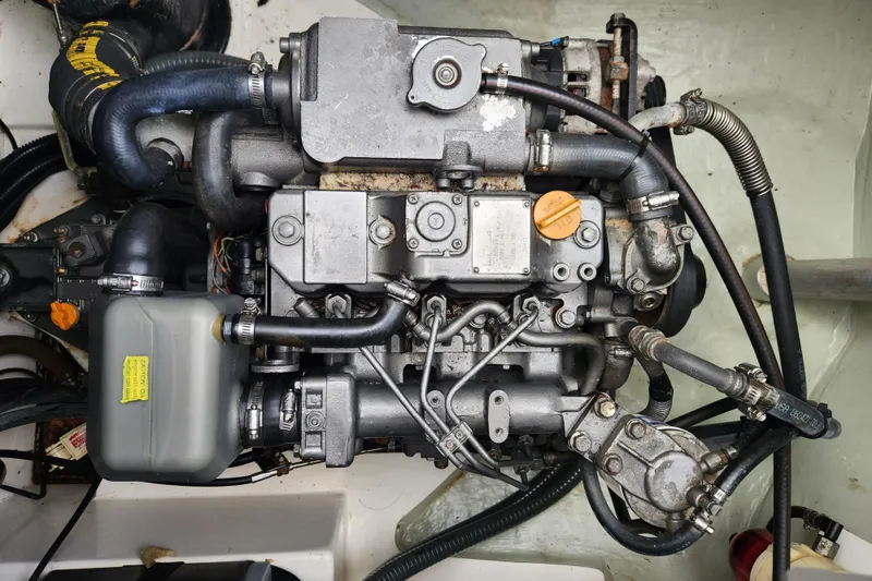 Slide: The Image of Engine of a 2015 Leopard 44 yacht, showcasing intricate mechanical components. - 109