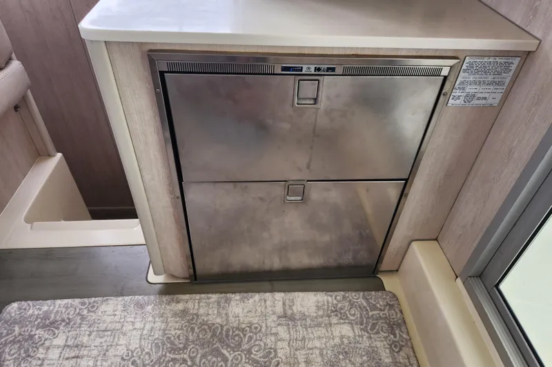 Slide: The Image of Stainless steel fridge in 2015 Leopard 44 catamaran interior. - 117