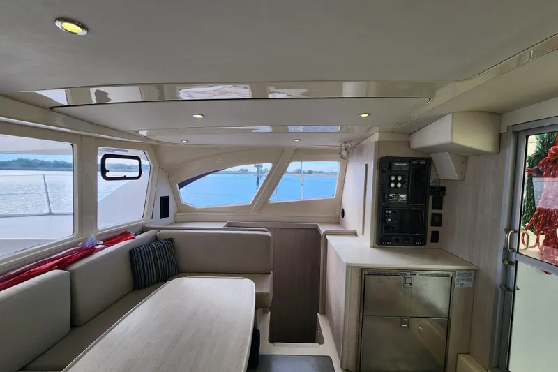 Slide: The Image of Interior of 2015 Leopard 44 catamaran with modern seating and control panel. - 122