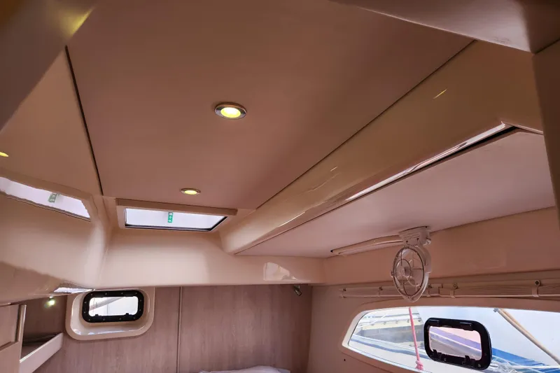 Slide: The Image of Interior of 2015 Leopard 44 yacht with skylights and modern lighting. - 139