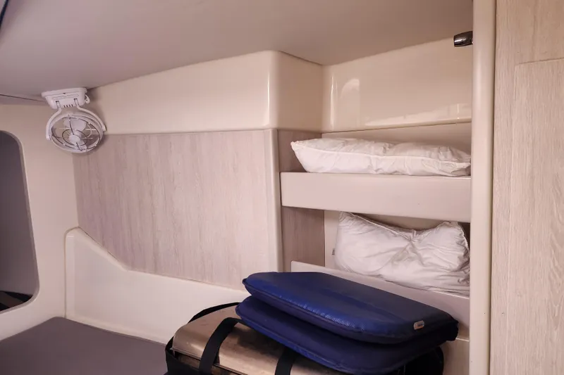 Slide: The Image of Interior cabin of a 2015 Leopard 44 yacht with pillows and fan. - 151