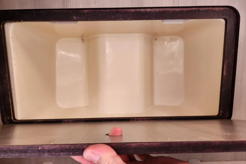 Slide: The Image of Open storage compartment of a 2015 Leopard 44 yacht, showing interior space. - 169