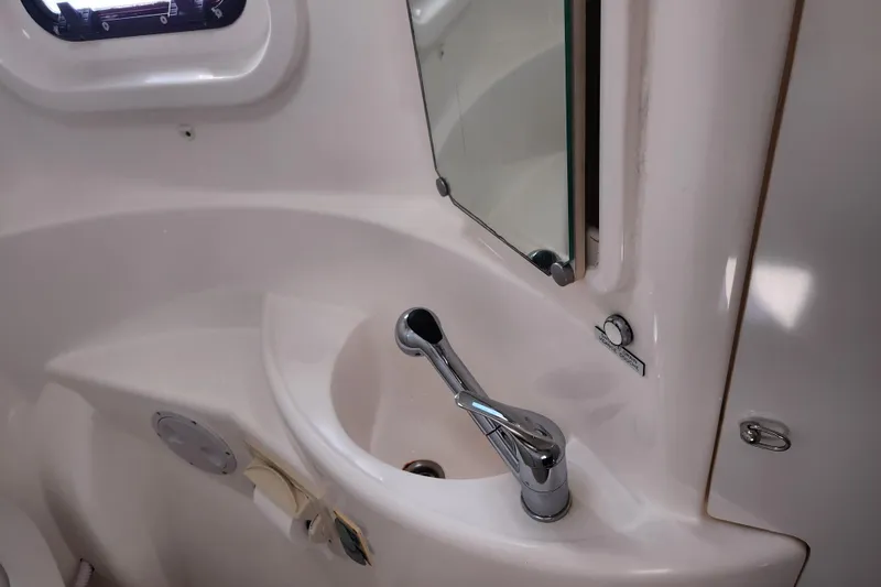 Slide: The Image of Compact bathroom sink and mirror in 2015 Leopard 44 yacht. - 172