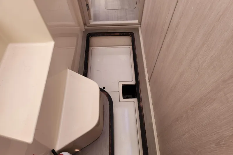 Slide: The Image of Interior view of a 2015 Leopard 44 yacht, showcasing storage compartments. - 175