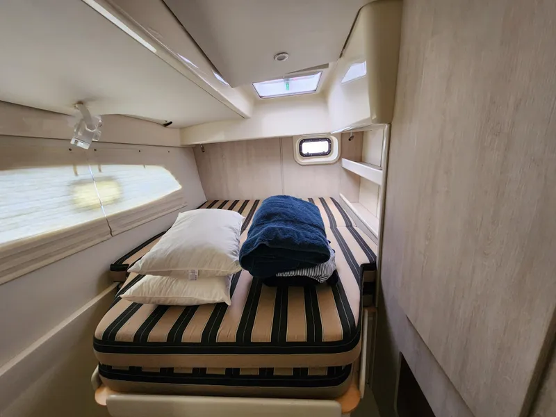 Slide: The Image of Storage compartment on Leopard 44 boat with diving gear and blue bag, 2015 model. - 22