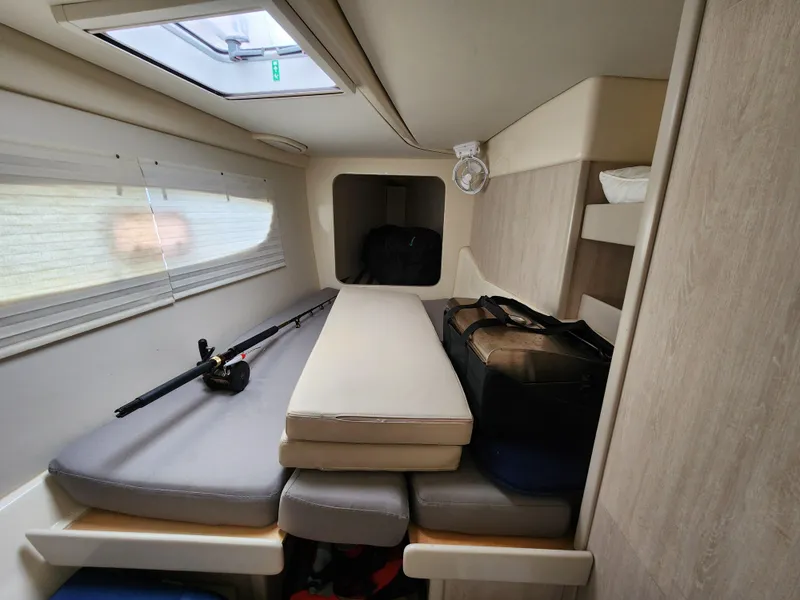 Slide: The Image of Leopard 44 catamaran interior view, docked at marina, showcasing sleek design and spacious layout. - 26