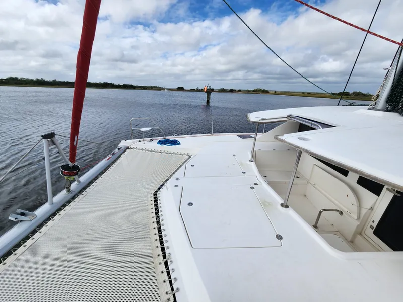 Slide: The Image of Steering wheel and navigation controls on a 2015 Leopard 44 catamaran. - 33
