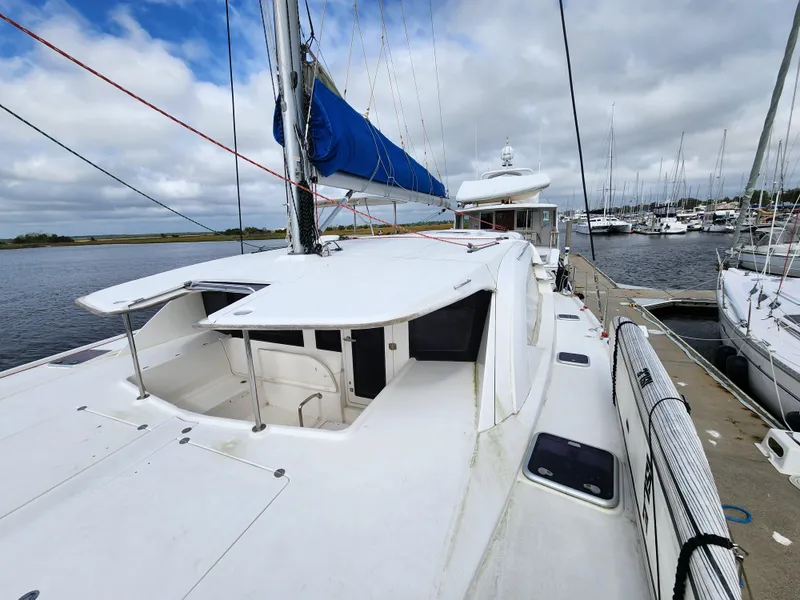 Slide: The Image of Boat navigation instruments on a 2015 Leopard 44 catamaran, displaying compass and speed data. - 37