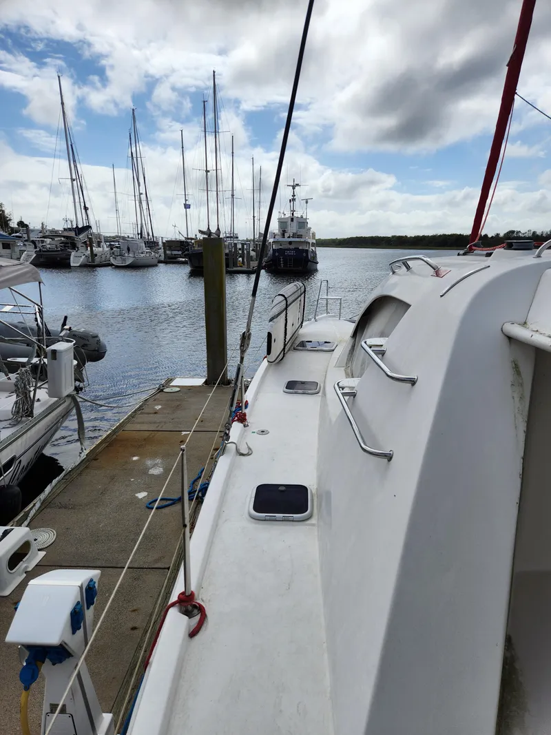 Slide: The Image of Cockpit of 2015 Leopard 44 yacht with steering wheel and ropes. - 43