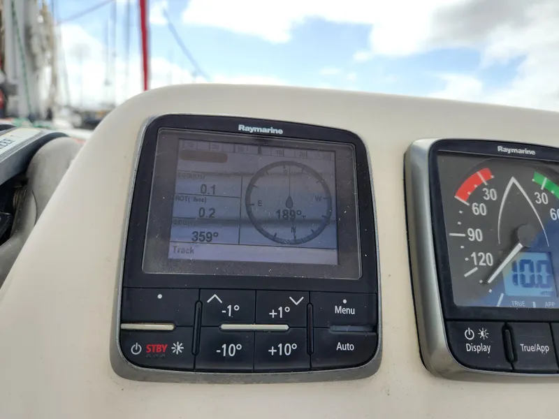 Slide: The Image of Helm of 2015 Leopard 44 catamaran with navigation equipment and ropes. - 44
