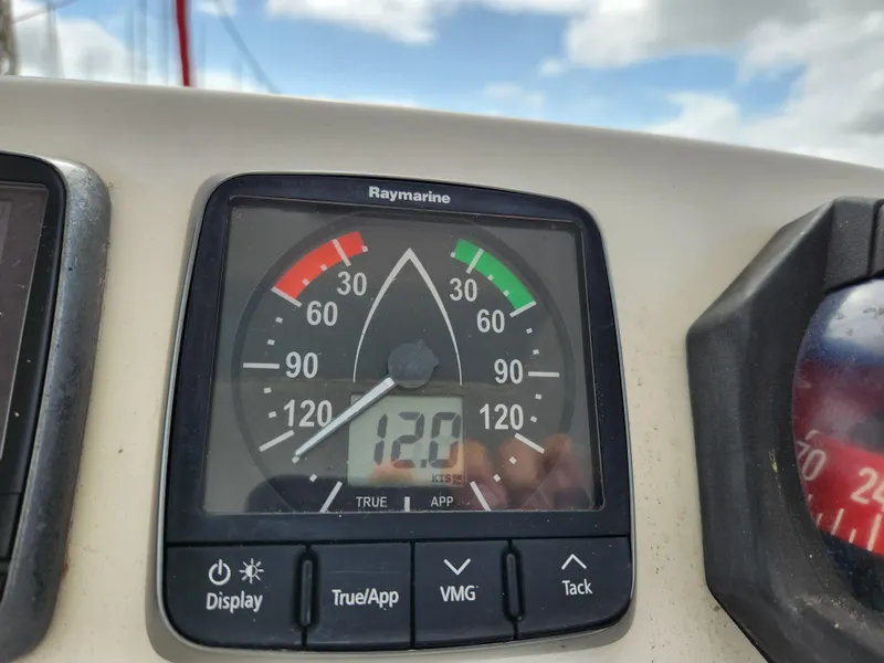 Slide: The Image of Sailing catamaran Leopard 44, 2015 model, docked on calm waters with visible rigging. - 45