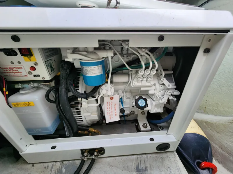 Slide: The Image of 2015 Leopard 44 catamaran docked at marina with cloudy sky backdrop. - 48