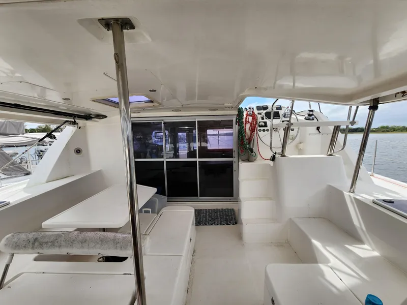 Slide: The Image of Leopard 44 catamaran docked, showing side view with ropes and fenders, 2015 model. - 5