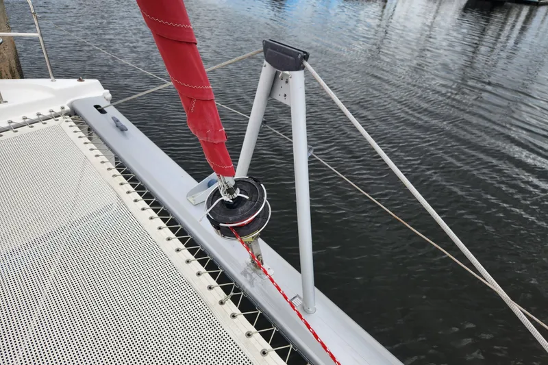 Slide: The Image of Leopard 44 catamaran deck with red sail and rigging, 2015 model. - 57