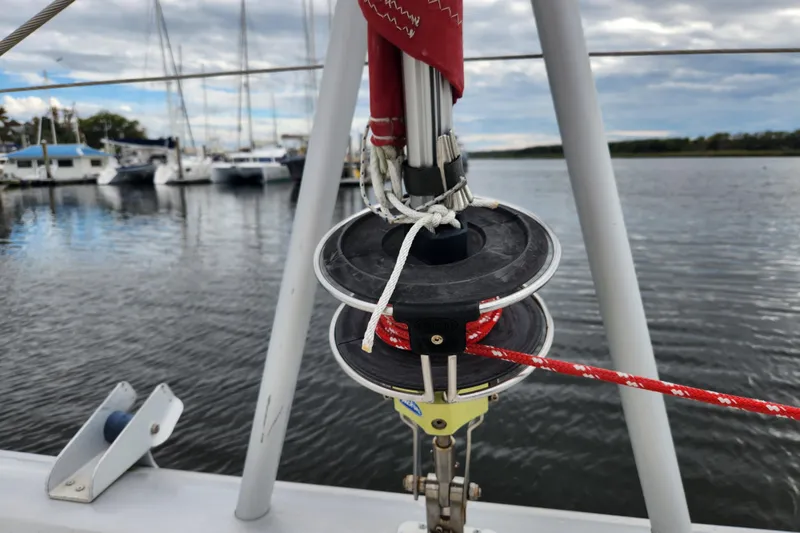 Slide: The Image of Close-up of a 2015 Leopard 44 sailboat rigging at a marina. - 58