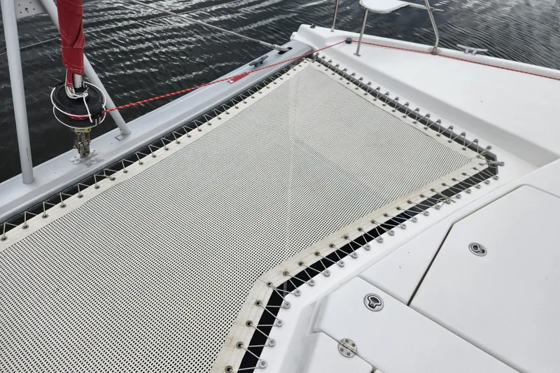 Slide: The Image of Trampoline netting on a 2015 Leopard 44 catamaran, showcasing deck details and rigging. - 60
