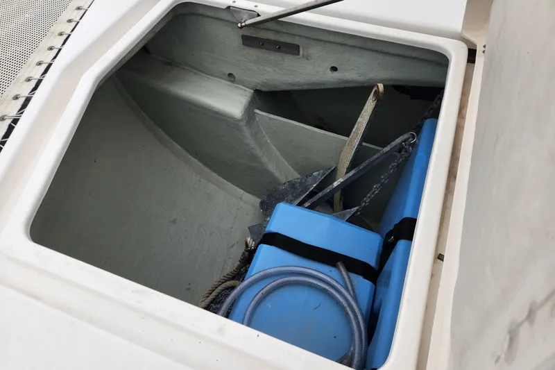 Slide: The Image of Storage compartment of 2015 Leopard 44 boat with anchor and blue equipment. - 67