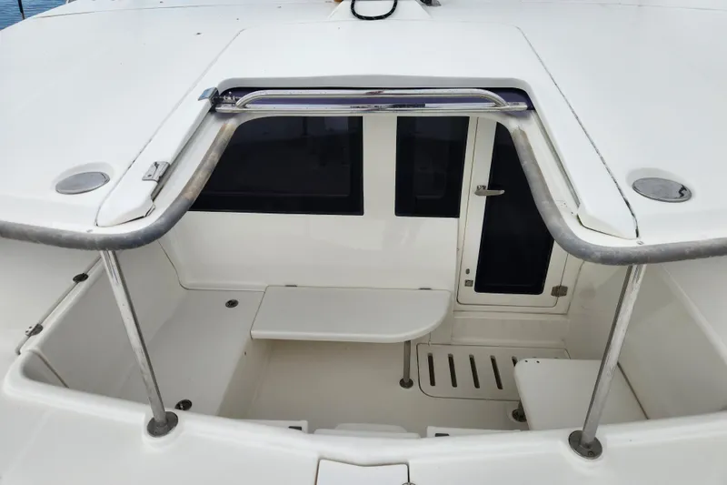 Slide: The Image of 2015 Leopard 44 catamaran cockpit with seating and access door. - 69
