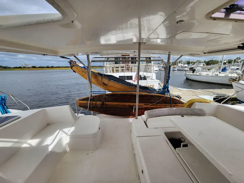 Slide: The Image of Leopard 44 catamaran, 2015 model, docked with clear skies and calm waters. - 7