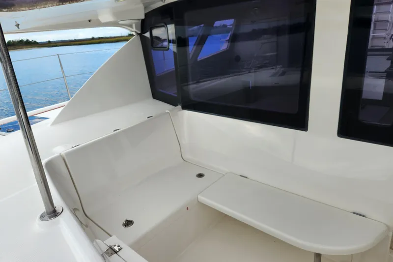 Slide: The Image of 2015 Leopard 44 yacht interior with seating area and large windows. - 70