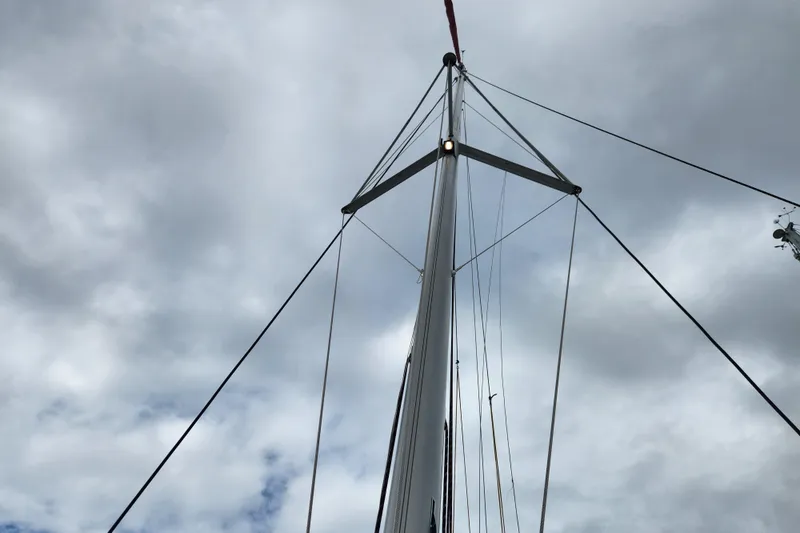 Slide: The Image of Mast of 2015 Leopard 44 sailboat against cloudy sky. - 85