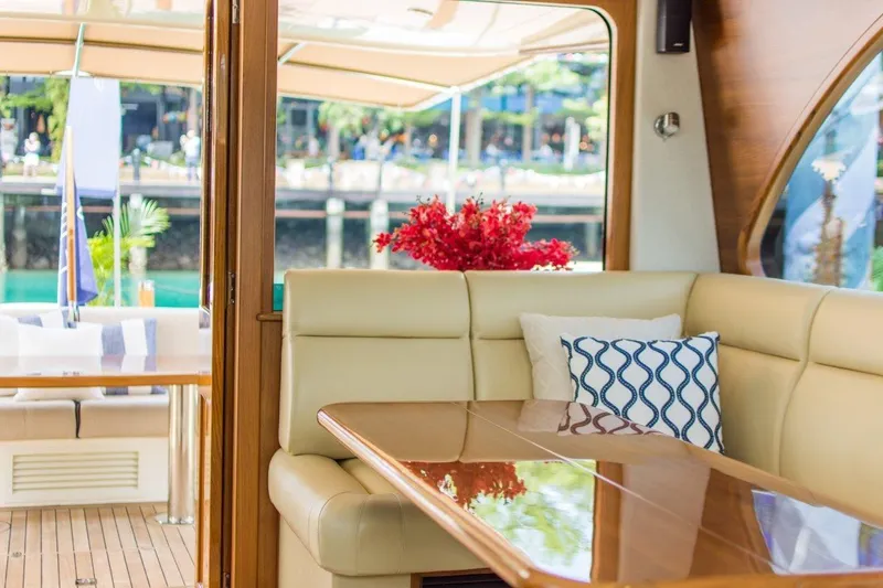 Slide: The Image of Luxurious interior of 2026 Palm Beach Motor Yachts PB52 with elegant seating and decor. - 11