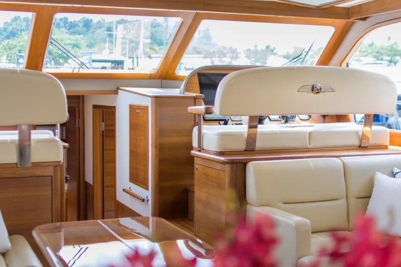 Slide: The Image of Luxurious interior of 2026 Palm Beach Motor Yachts PB52, featuring elegant wood and leather design. - 13
