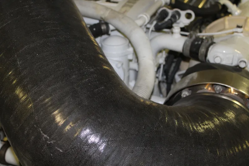 Slide: The Image of Engine components of a 2003 Viking 65 Convertible Enclosed Bridge yacht. - 41